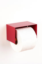 画像をギャラリービューアに読み込む, Red wall-mounted toilet paper holder with a roll of toilet paper on a white background