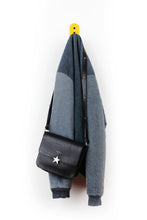 Charger l'image dans la galerie, yellow wall hook with blue jacket and deep blue purse