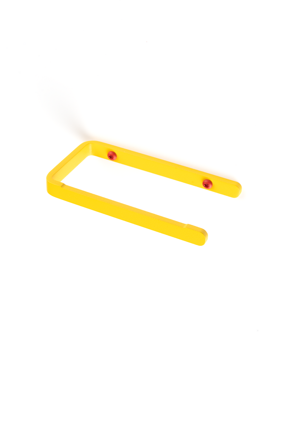 yellow toilet paper holder with red screws