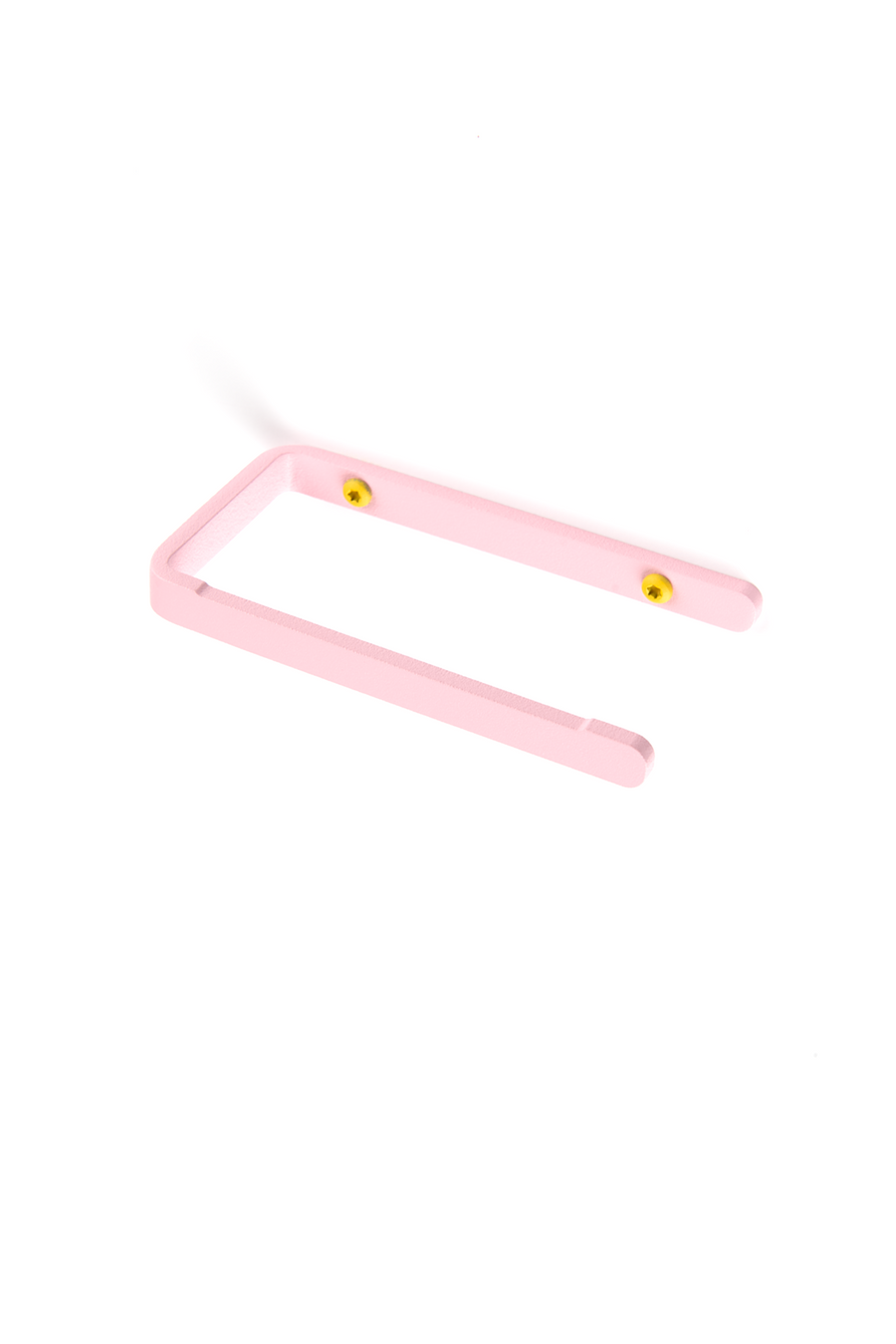 Pink toilet paper holder with yellow screws