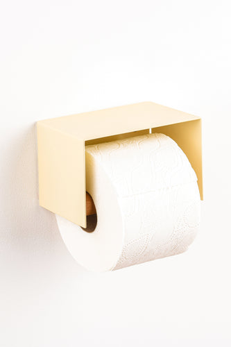 ivory cream toilet paper holder in nice design where you can put things on top like a phone or candle or some small accessories.  