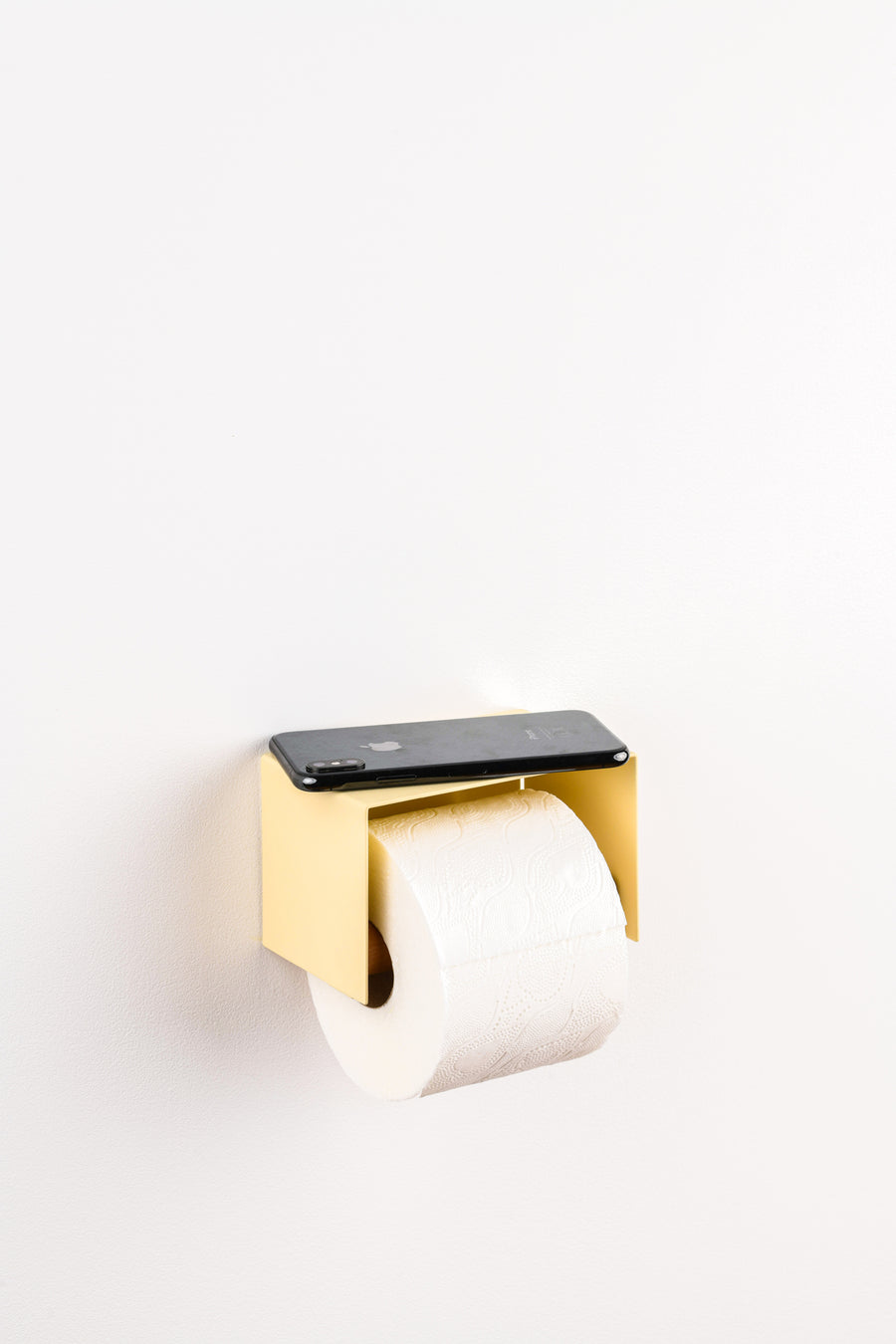 ivory cream white toilet paper holder in nice design where you can put things on top like a phone or candle or some small accessories.  