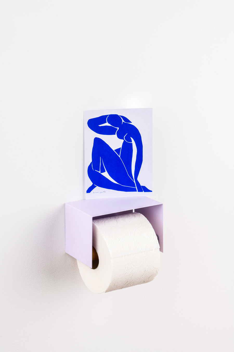 lavender purple toilet paper holder in nice design where you can put things on top like a phone or candle or some small accessories.  