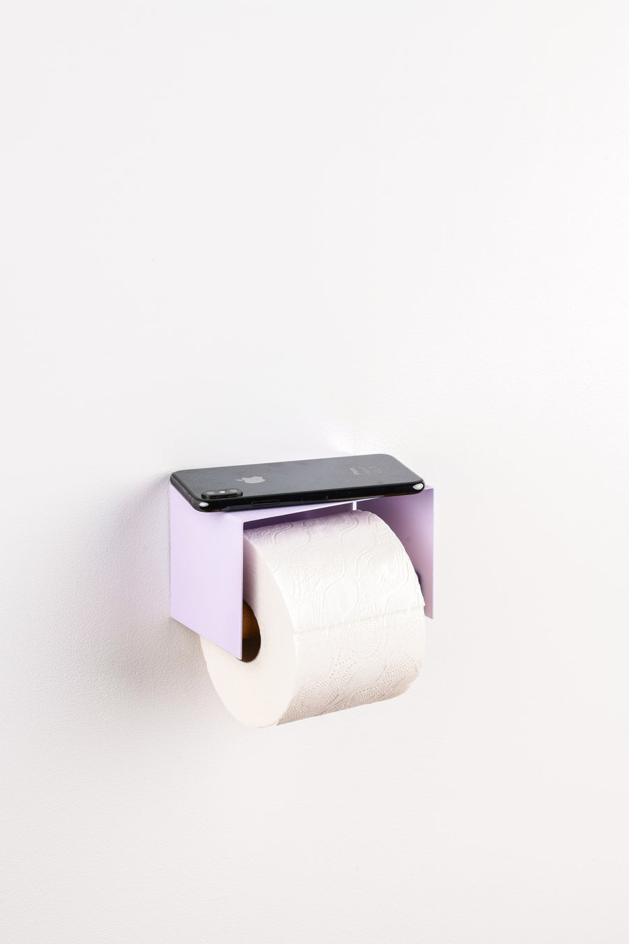 lavender purple toilet paper holder in nice design where you can put things on top like a phone or candle or some small accessories.  