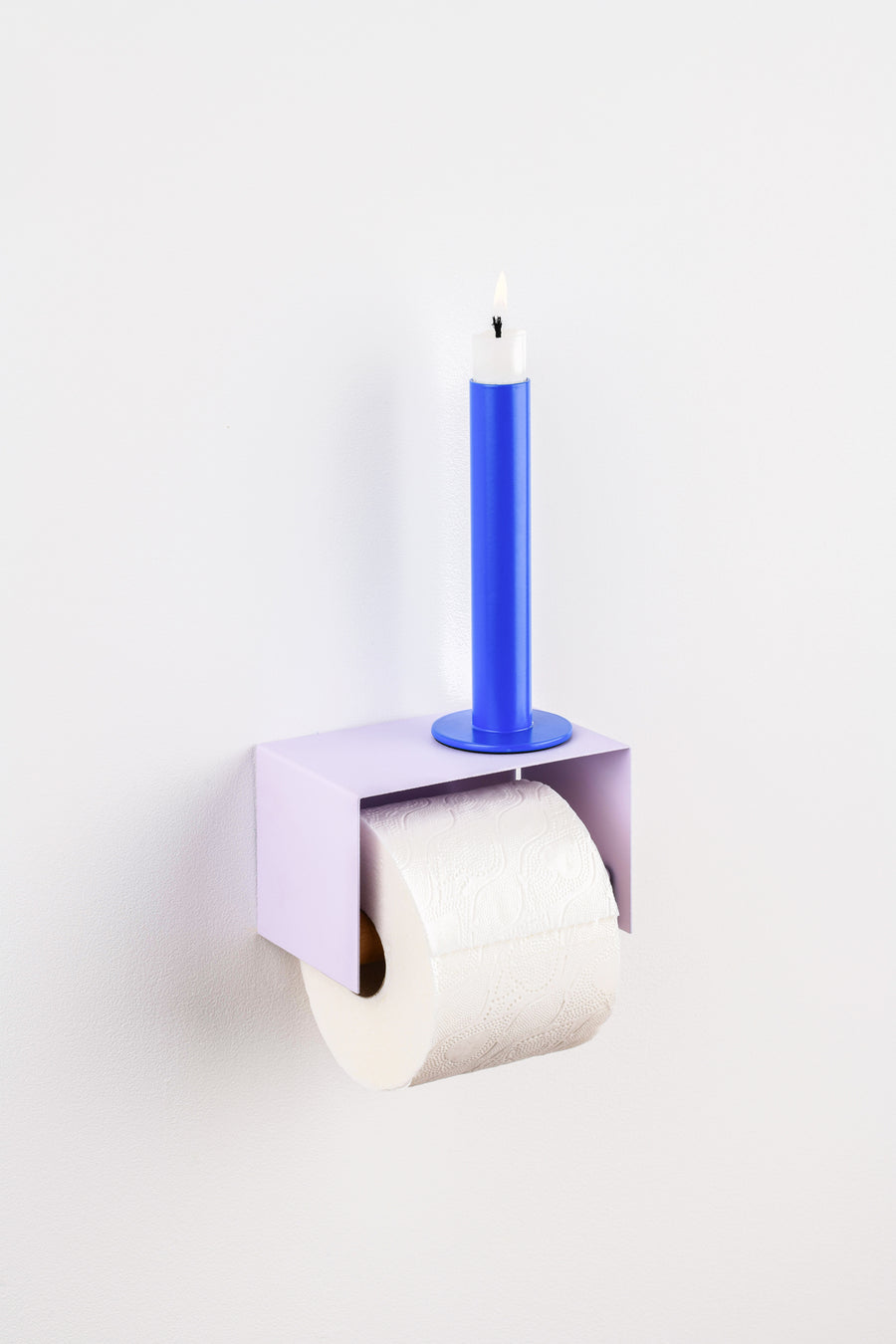 lavender purple toilet paper holder in nice design where you can put things on top like a phone or candle or some small accessories.  