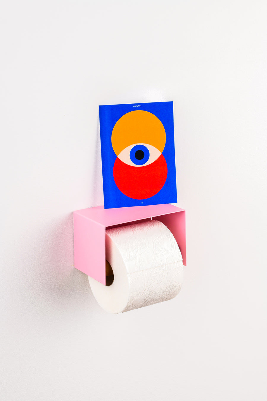pink toilet paper holder in nice design where you can put things on top like a phone or candle or some small accessories. 