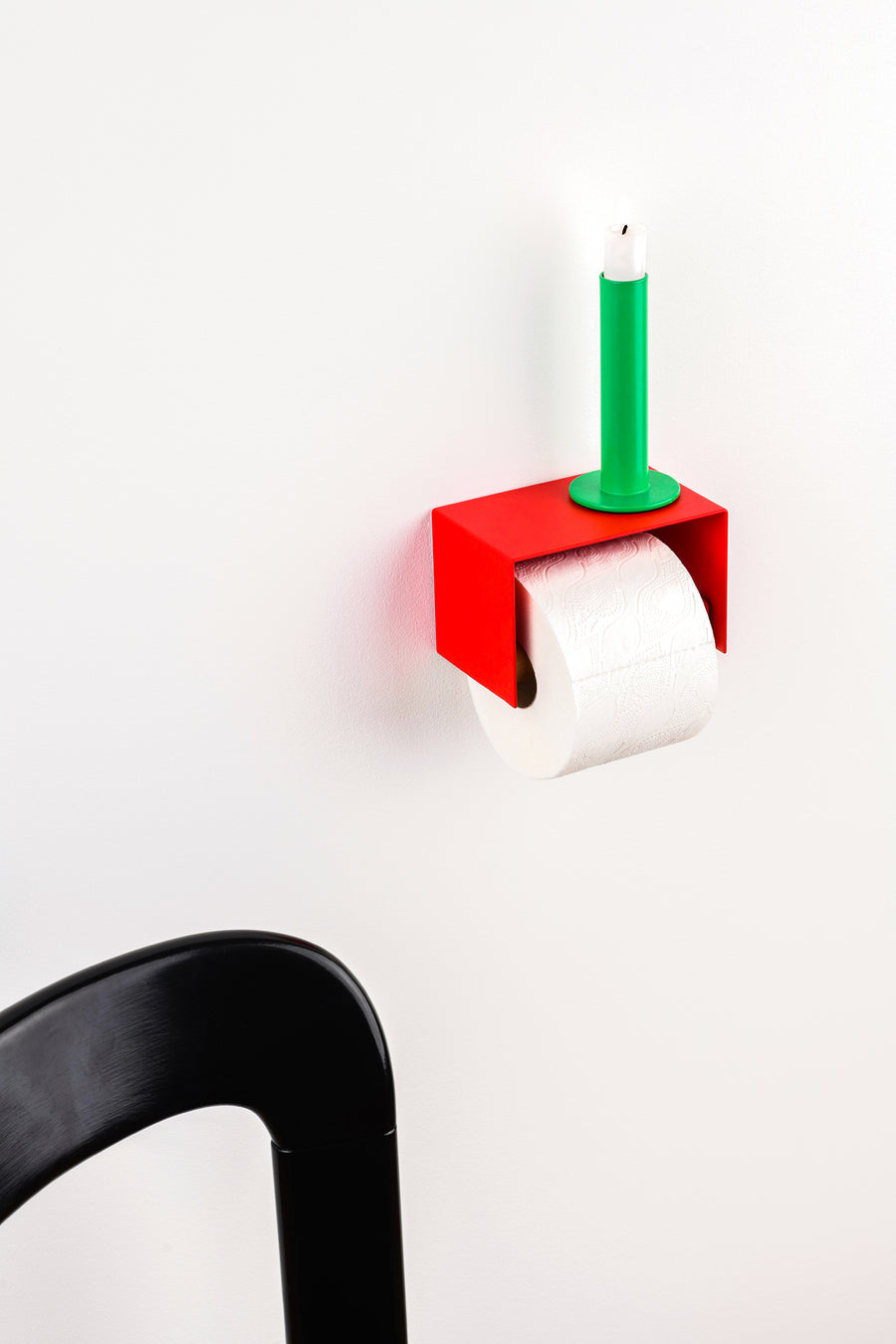 red toilet paper holder in nice design where you can put things on top like a phone or candle or some small accessories