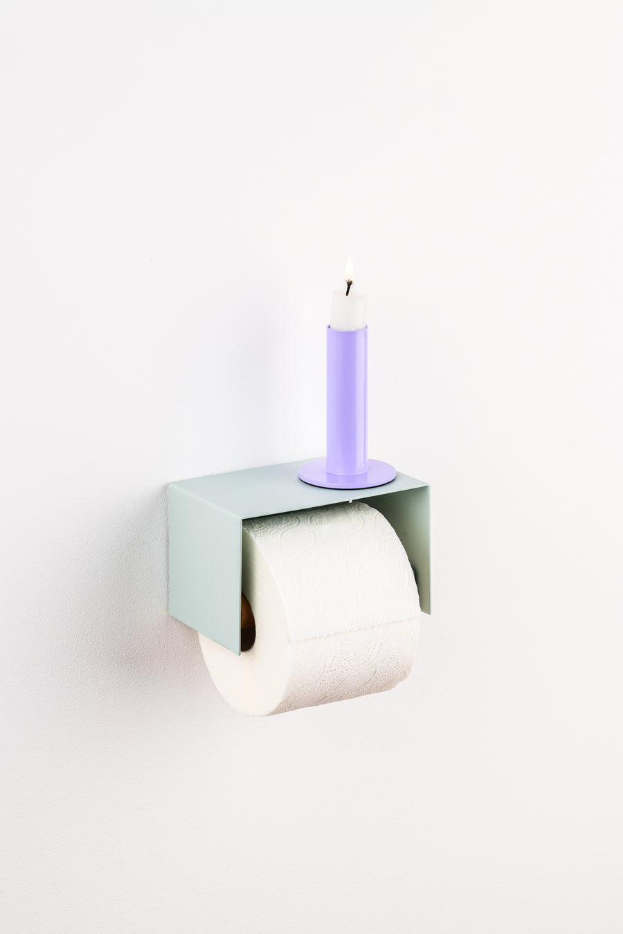 sage green toilet paper holder in nice design where you can put things on top like a phone or candle or some small accessories.  