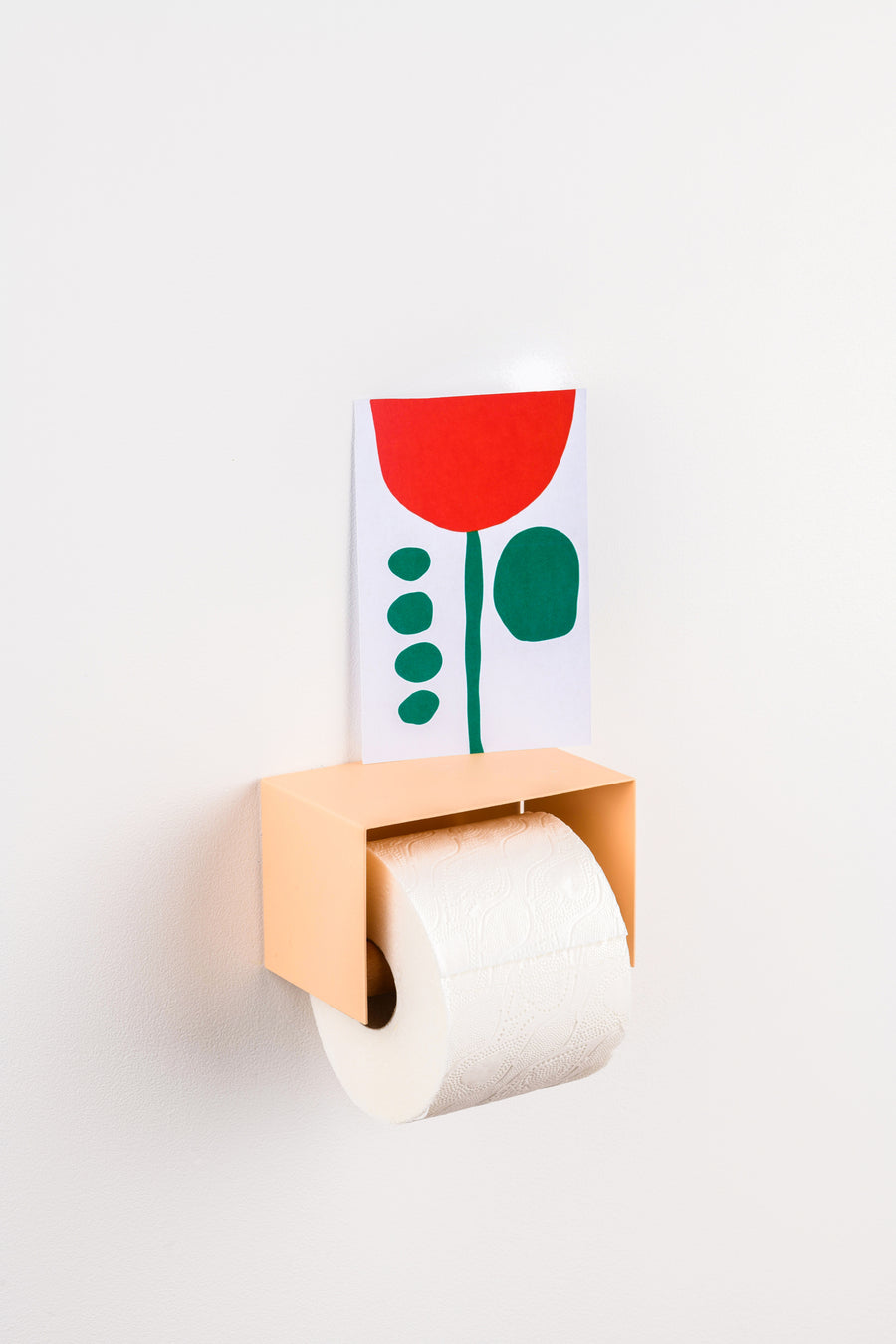 salmon pink toilet paper holder in nice design where you can put things on top like a phone or candle or some small accessories.  