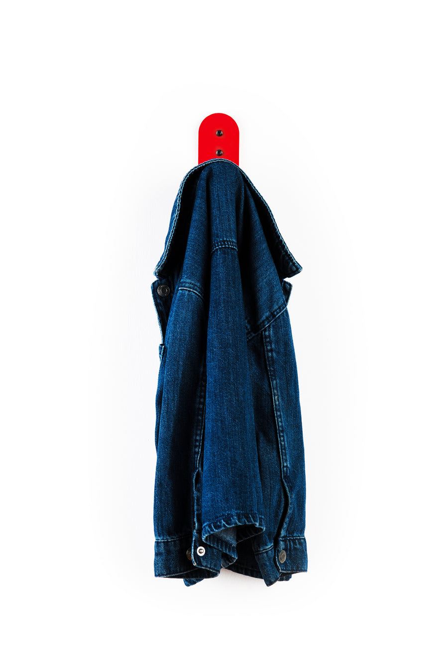 red wall hook with blue denim kids jacket
