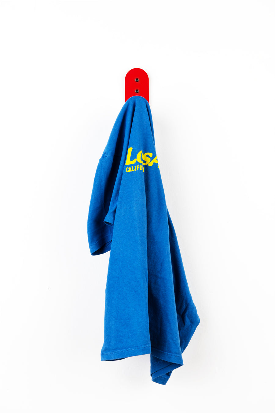 Red wall hook with blue tshirt