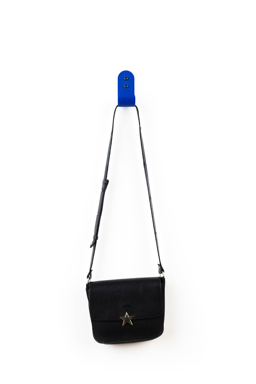 blue wall hook with blue purse