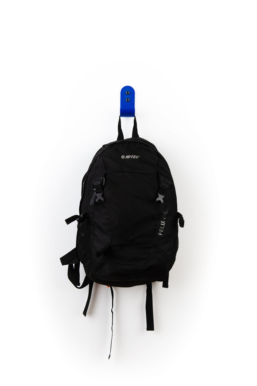 Blue wall hook with black hi-tec backpack 