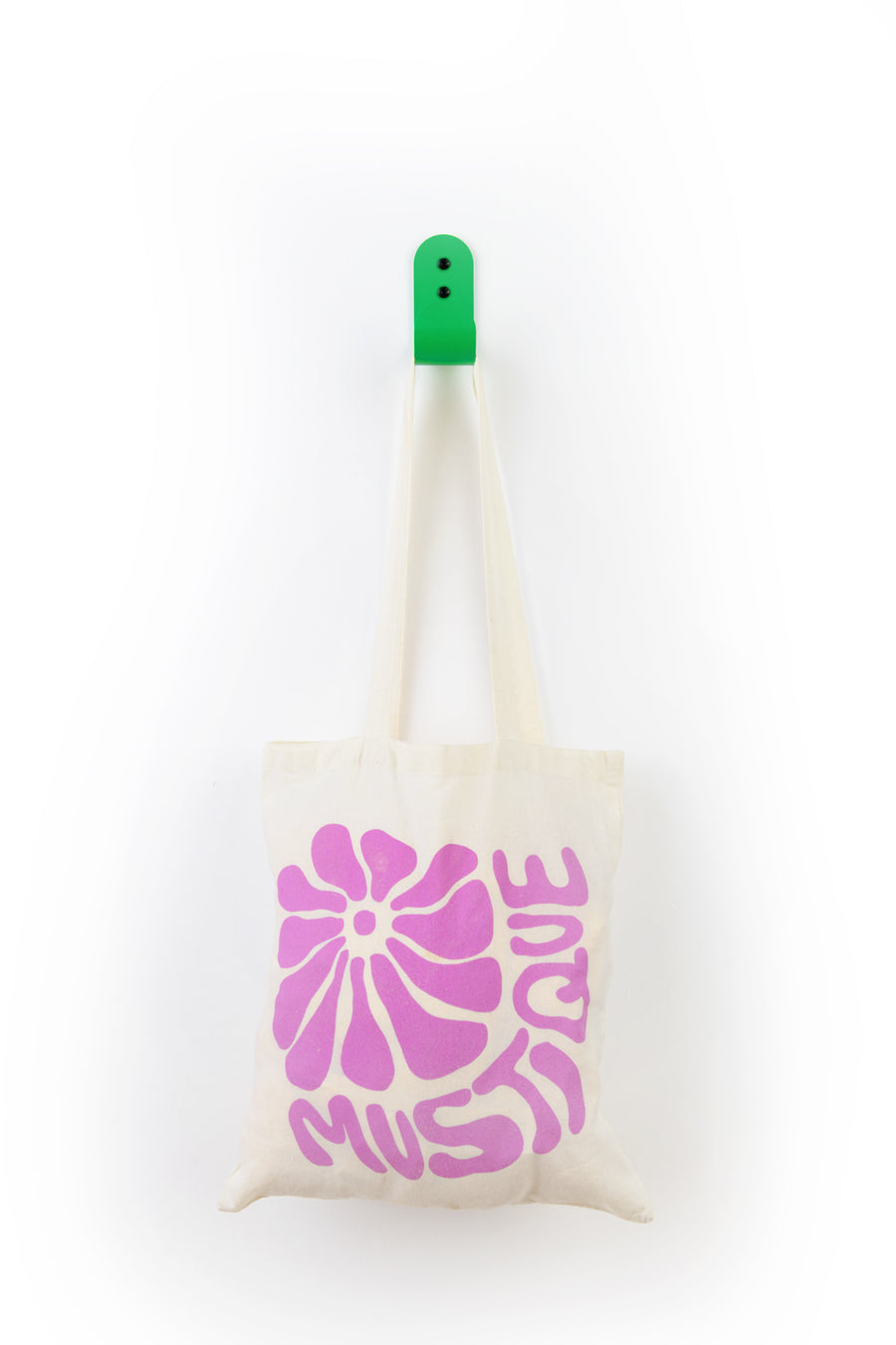 green wall hook with white and purple totebag mustique