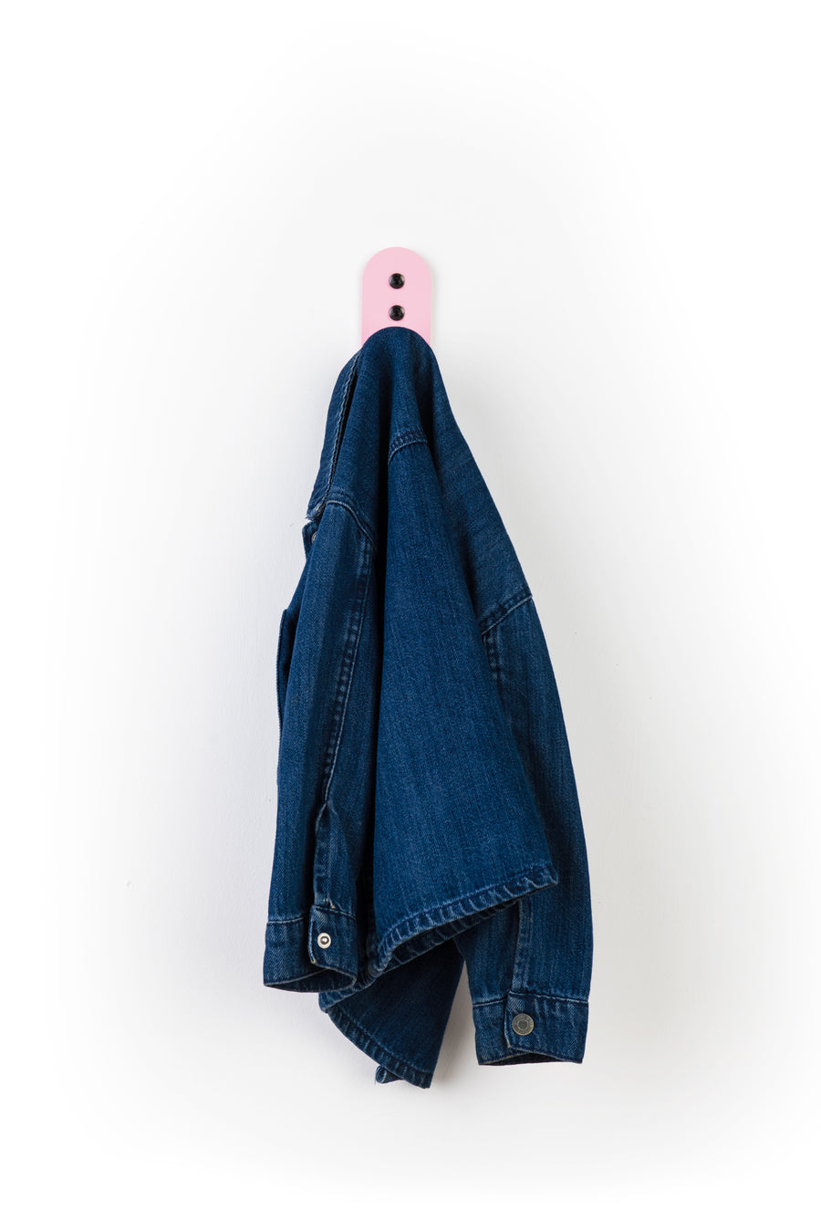 pink wall hook with blue denim kids jacket