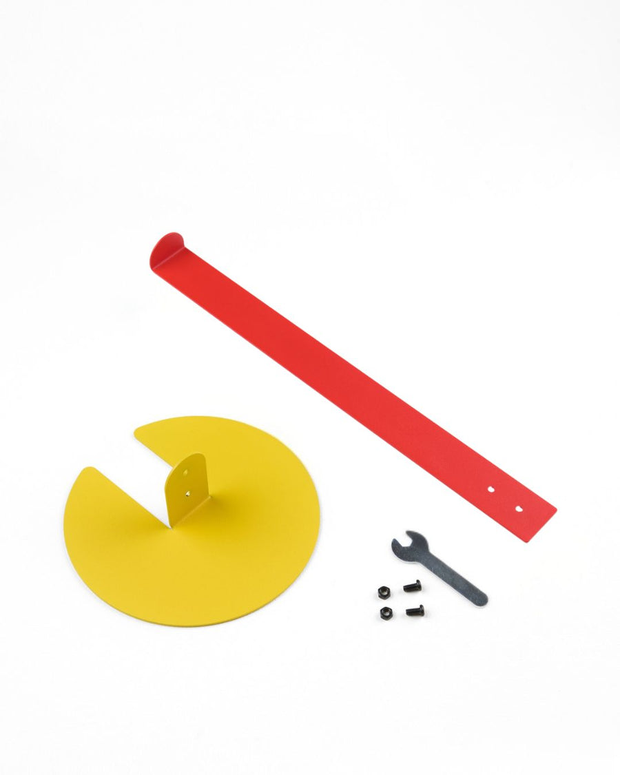 Kitchen paper dispenser or holder for extra toilet rolls in yellow and red combination